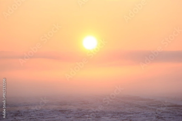 Fototapeta Crisp and Cold Sunrise in the Fog Covered Valley.