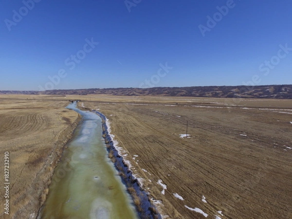 Fototapeta Drone View of the Qu'Appelle River in March.