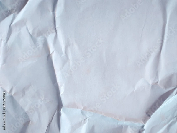 Obraz White crumpled paper texture background. Wrinkled and folded white paper sheet surface for overlay or grunge texture.