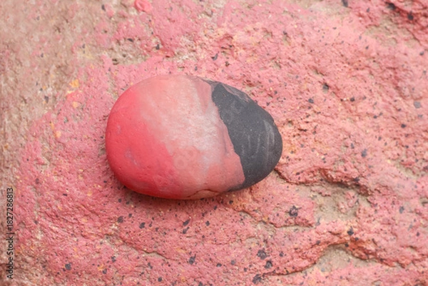 Obraz Stone with paint pink and black background