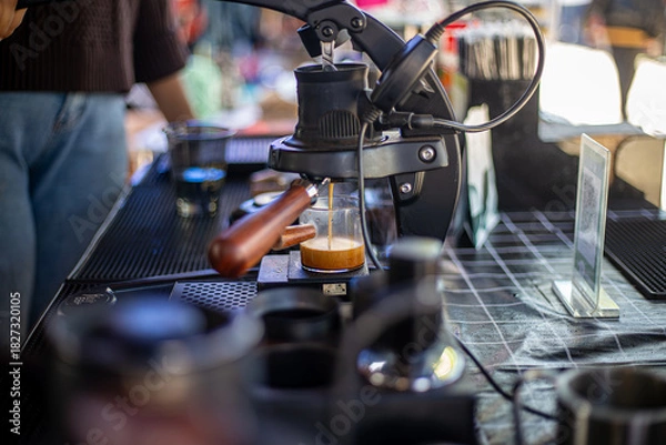 Fototapeta Sustainable Coffee in the Local Market: Human and Nature Power Transparent Coffee Cups Reflect Responsible Consumption Culture Green Baristas: One Drink Reduces Your Carbon Footprint
