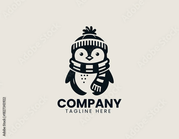 Obraz Adorable penguin wearing a cozy scarf and warm hat in a friendly winter themed black vector logo illustration