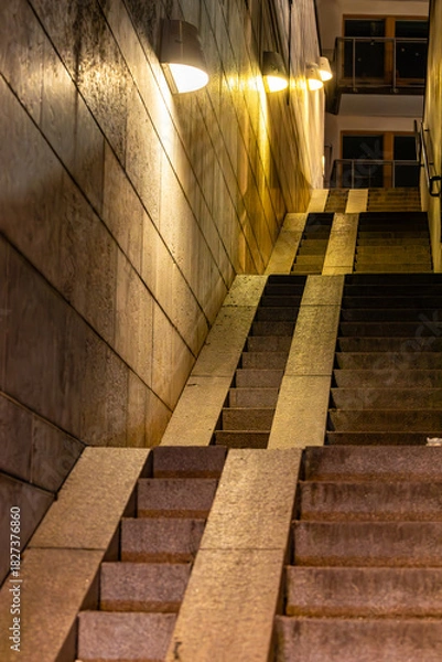 Obraz Stockholm, Sweden  An urban staircase with a baby carriage ramp at night.