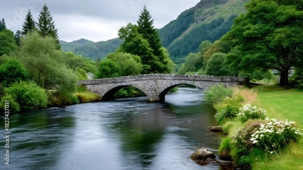 Fototapeta Bridge of Orchy spanning river Orchy in Scottish highlands