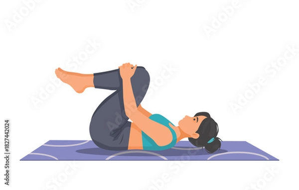 Fototapeta Woman practicing yoga doing wind relieving pose on the mat