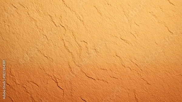 Fototapeta Rough orange stone surface texture with natural gradient shading and subtle surface fissures