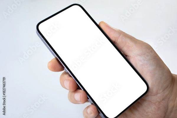 Obraz Male hand holding phone with isolated screen on white background