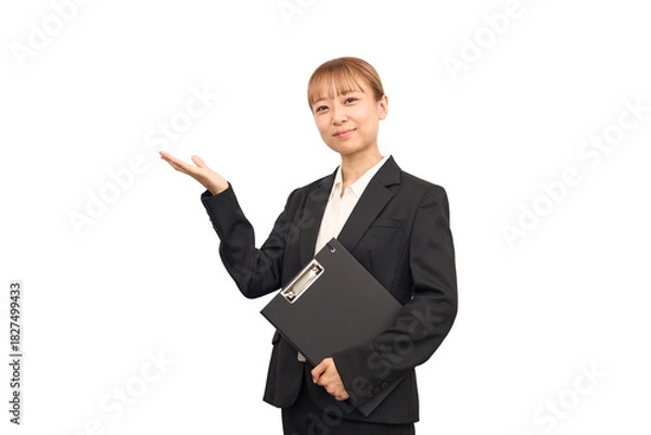 Obraz どうぞのポーズをビジネススーツを着た女性