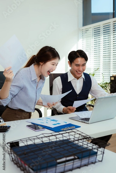 Fototapeta Happy smiling businessman feel happy work complete Teamwork success, success at work in the office concept.