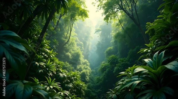 Fototapeta Lush green rainforest canopy view with dense foliage and bright sunlight shining through tall trees creating scenic landscape and natural environment in tropical jungle