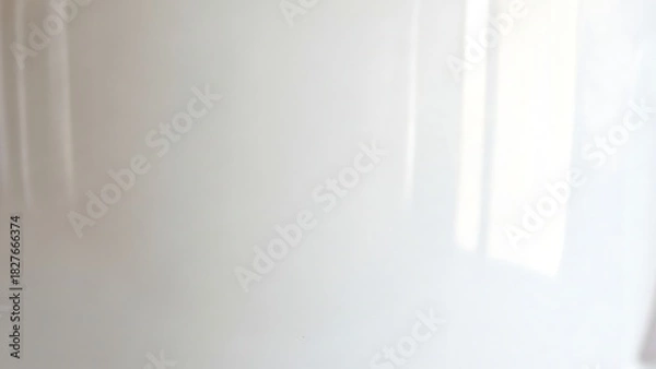 Fototapeta Abstract White Background with Subtle Light and Shadow Play.