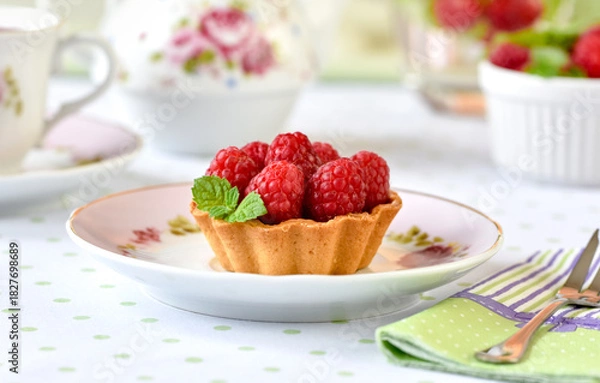 Fototapeta Mini tart with raspberries fruits on the table
