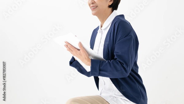 Obraz 問診をする白衣の女性