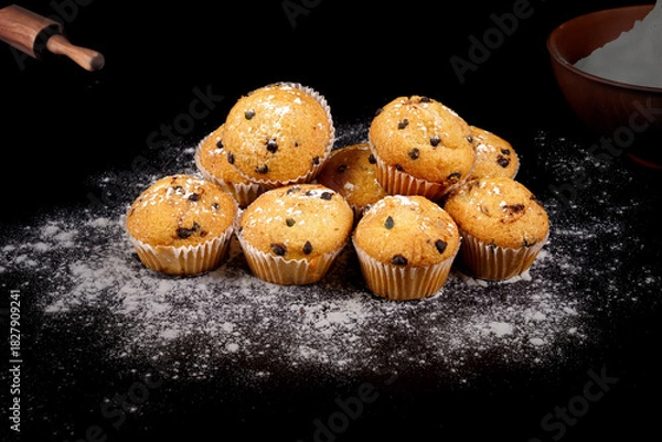 Obraz muffins sur fond noir