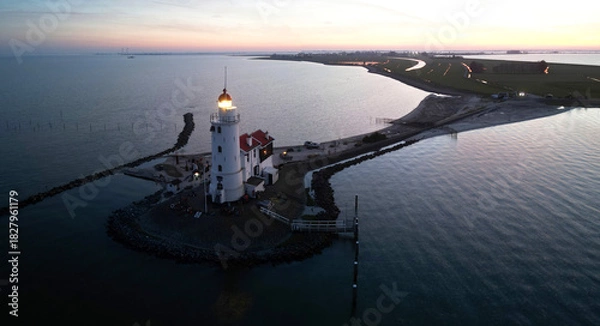 Fototapeta Drone view of the famous Lighthouse of Marken or Paard van Marken, The Netherlands