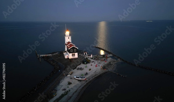 Fototapeta Drone view of the famous Lighthouse of Marken or Paard van Marken, The Netherlands