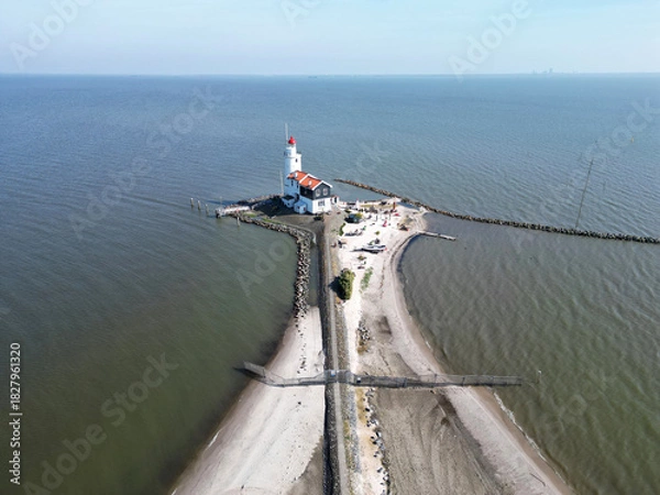 Fototapeta Drone view of the famous Lighthouse of Marken or Paard van Marken, The Netherlands