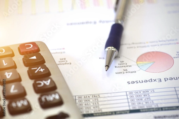 Fototapeta Review accounting data and calculate production income.