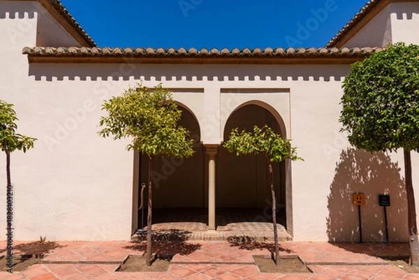 Obraz Malaga, Spain - August 06, 2024: Walls and bastion of the castle fort Gibralfaro in Malaga. Castillo de Gibralfaro.