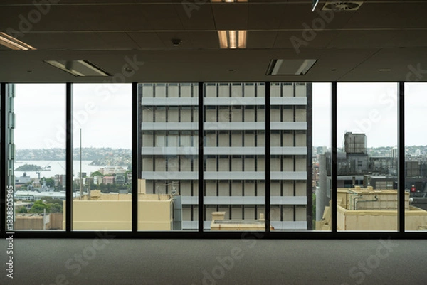 Fototapeta Modern empty office interior with large glass windows views