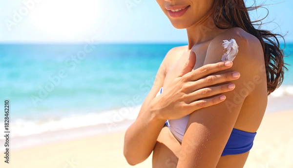 Obraz Protecting Skin on a Tropical Beach Sunscreen Application
