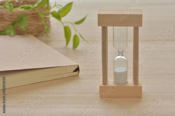 Fototapeta 砂時計　木目背景

