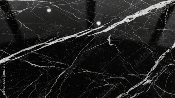 Fototapeta Stunning black marble texture with elegant white veins for modern interiors, luxurious designs, or artistic backgrounds offering sophisticated style