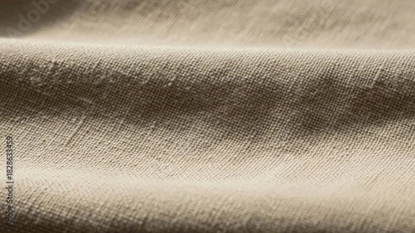 Fototapeta Elegant neutral fabric texture close-up for fashion design and interior decorating projects, perfect for backgrounds and textile mockups with a soft, calming feel