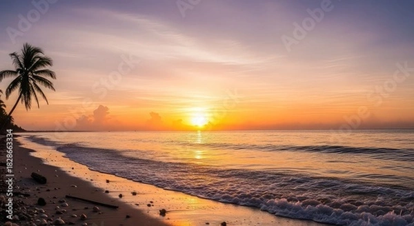 Obraz Tropical beach sunset with a palm tree silhouette and golden ocean waves.