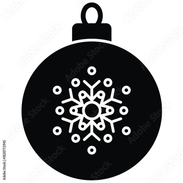 Fototapeta Black silhouette of a Christmas bauble with a white snowflake design and hanging loop ornament decoration