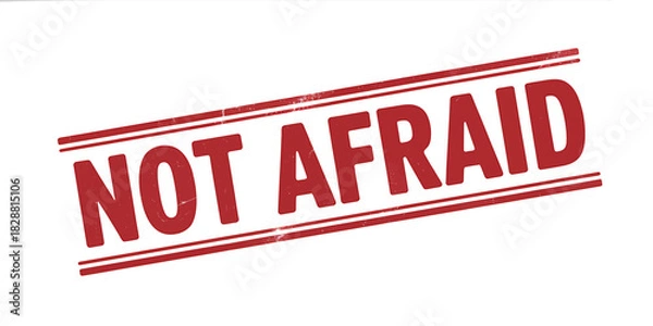 Fototapeta Bold Statement Not Afraid Red Stamp on White Background Symbolizing Courage and Resilience