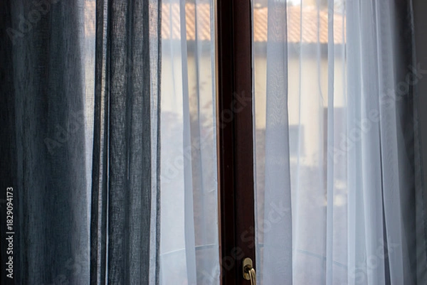 Obraz Sad, Quiet Room with Gray Light Through Curtains