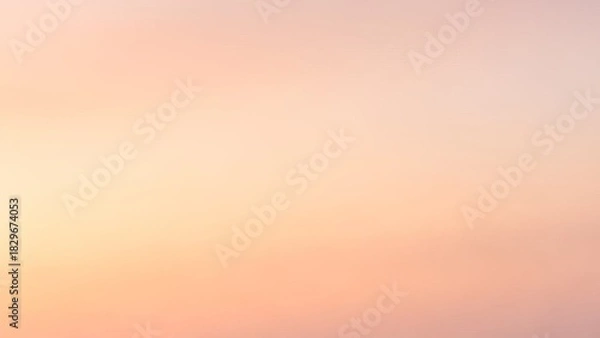 Fototapeta Gentle peach gradient background for modern designs, adding a touch of warmth and serenity to your creative projects with its soft pastel hues