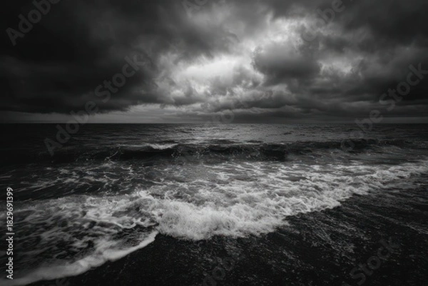 Obraz Ominous Storm Clouds Gather Over Restless Sea Shore