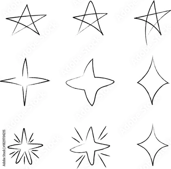 Fototapeta Hand-drawn stars and sparkle set isolated on white background. Vector illustration