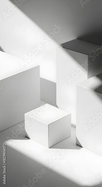 Fototapeta Abstract composition of white geometric cubes arranged in a minimalist setting, illuminated by strong light creating sharp shadows.