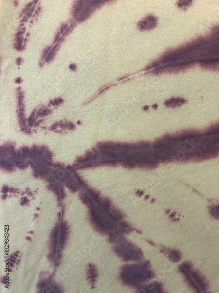Obraz Abstract purple tie-dye pattern on fabric with soft organic shapes and blurred dye edges. Vibrant textured background ideal for textile design, boho style, crafts, and artistic decorative concepts.