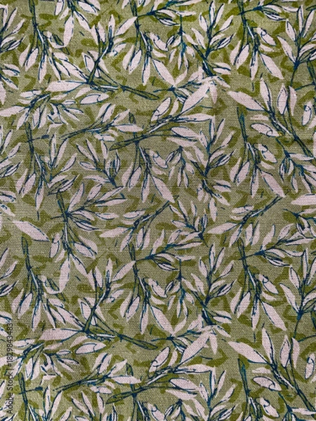 Obraz Fabric texture with a repeating botanical pattern of hand-drawn leaves in green and white tones. Natural organic background suitable for textiles, wallpapers, and decorative design.