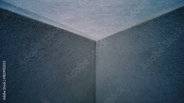 Obraz Close-up of smooth gray sealant applied at the junction of contrasting surfaces for precise finishing.