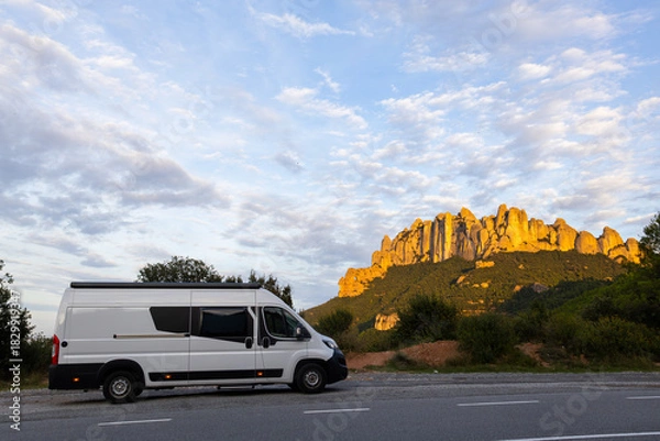 Obraz Camper van parked admiring Montserrat mountains at sunset