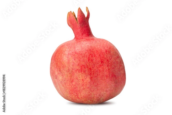 Obraz Fresh red pomegranate with a smooth surface and distinctive crown, perfect for autumn recipes