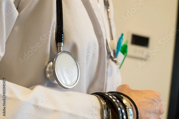 Obraz Healthcare Professional in Lab Coat with Dangling Bracelets, Risk of Contamination and Poor Hygiene
