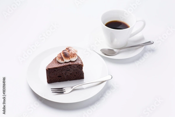 Obraz 皿に盛られたケーキとコーヒー ガトーショコラ 白背景