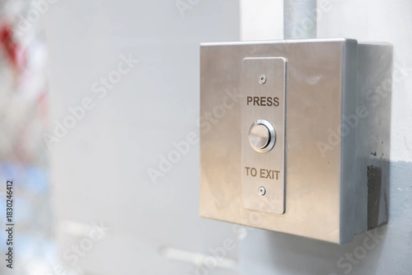 Obraz Press to exit button on security system access control wall