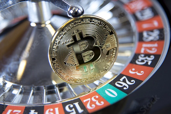 Fototapeta bitcoin on the table in the casino