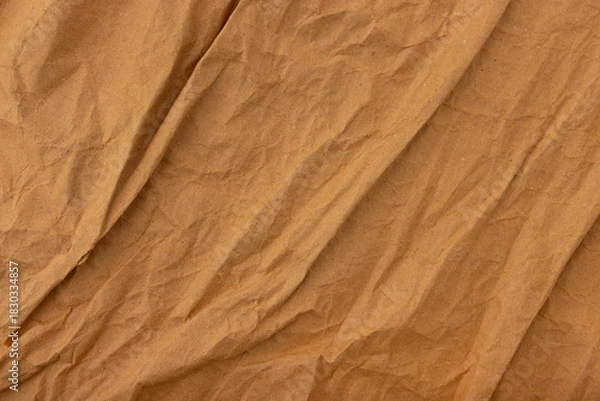 Fototapeta Abstract old wrinkled brown crumpled paper texture background