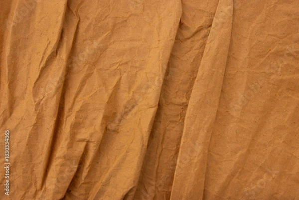 Fototapeta Abstract old wrinkled brown crumpled paper texture background