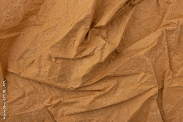 Fototapeta Abstract old wrinkled brown crumpled paper texture background