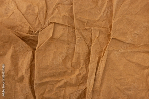 Fototapeta Abstract old wrinkled brown crumpled paper texture background