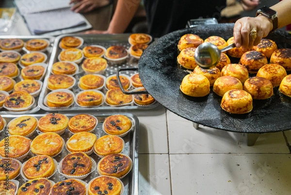 Obraz A traditional Indonesian cake called Kue Lumpur, made from potatoes.